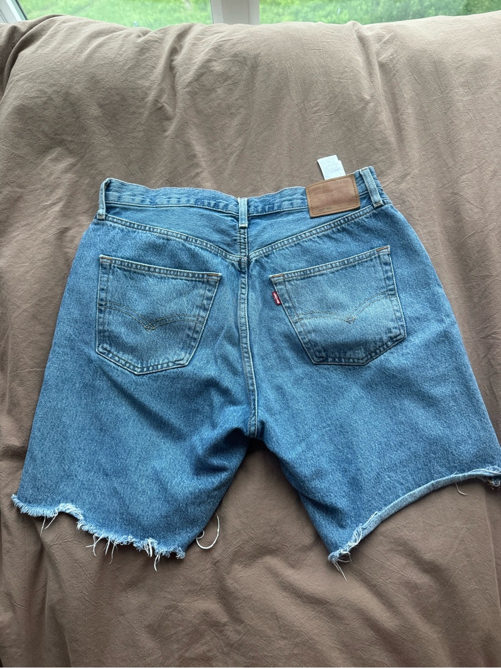 Levi's Light Blue Denim Shorts with Frayed Hem